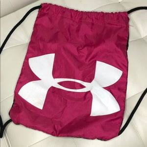 Pink and black Under Armour drawstring bag